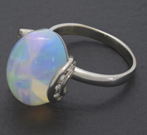 18ct White Gold 0.15ct Diamond And Opal Dress Ring