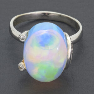 18ct White Gold 0.15ct Diamond And Opal Dress Ring