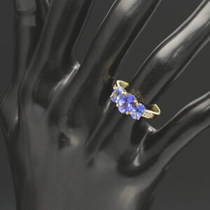 18ct Yellow Gold 0.09ct Diamond And 2.05ct Tanzanite 3 Stone Ring