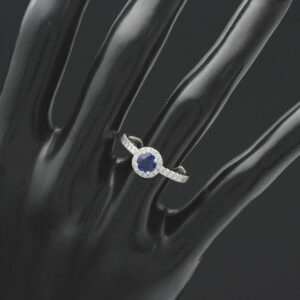 Platinum 0.20ct Diamond And 0.50ct Sapphire Halo Ring
