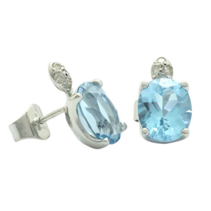 18ct White Gold Blue Topaz And 0.08ct Diamond Stud Earrings