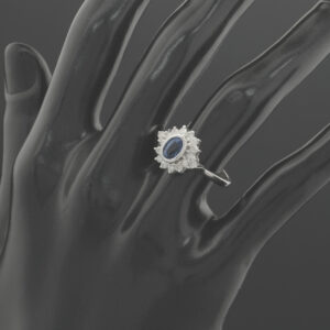 18ct White Gold 0.48ct Diamond And 0.50ct Blue Topaz Cluster Ring