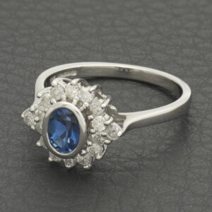 18ct White Gold 0.48ct Diamond And 0.50ct Blue Topaz Cluster Ring