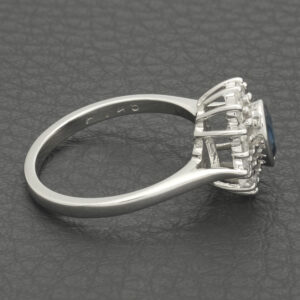 18ct White Gold 0.48ct Diamond And 0.50ct Blue Topaz Cluster Ring